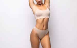 Woman with flat abdomen after tummy tuck in Worcester, MA