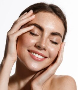 Woman with smooth skin after chemical peel treatment in Dennis, MA